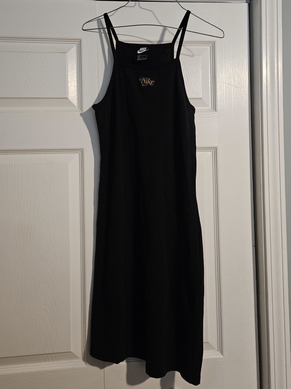 Nike Sportswear Femme tank dress in black featuring a gold logo Size S
